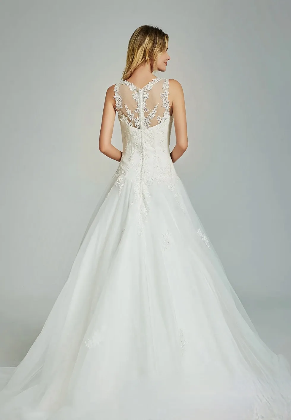 Elegant A-Line Sheer Back Bridal Gown With Appliques