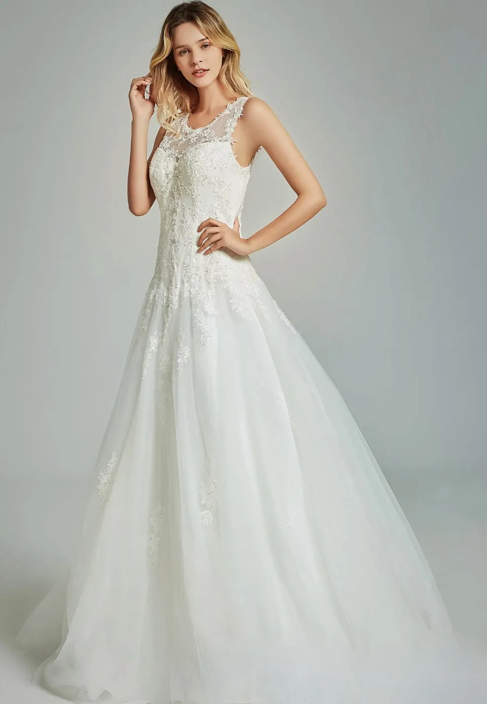 Elegant A-Line Sheer Back Bridal Gown With Appliques